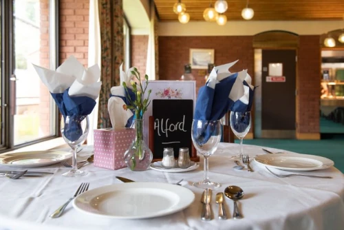 A prepared dining table at Cadogan court
