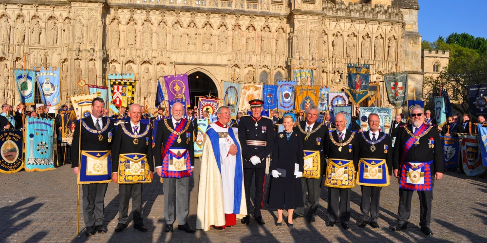 Main Photo shows, accompanied by banners from across the South-West, l-r: Simon Taylor [Grand Director of Ceremonies], Ray Guthrie [Head of Freemasonry in Somerset], Gareth Jones OBE [3rd Grand Principal, Royal Arch Masonry], Jonathan Greener [Dean of Exeter Cathedral], David Fursdon [Lord Lieutenant of Devon], The Countess of Arran, David Medlock [Assistant Grand Master], Nicholas Ball [Head of Freemasonry in Devon], Michael Pritchard [Deputy Head of Freemasonry in Cornwall], Jonathan Arnold [Head of Royal Arch Freemasonry in Cornwall]