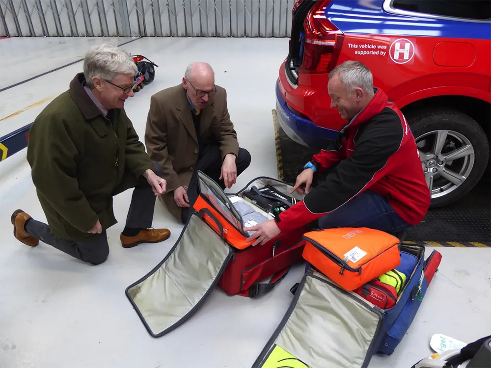 W Bro Tim Golder (Asst PGM), W Bro Anthony Eldred (Prov Charity Steward) and John Shaddick (Paramedic) explains some of the rapid response equipment carried in the cars. 