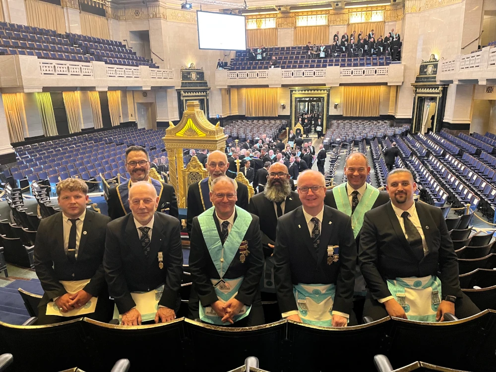 Pictured are 9 brethren including the Devonshire Membership Officer, Brendan Brookshaw, Devonshire Mentor Chris Bird and a number of other brethren from across Devon, within the Grand Meeting Room at 60 Great Queen Street, national headquarters of the United Grand Lodge of England