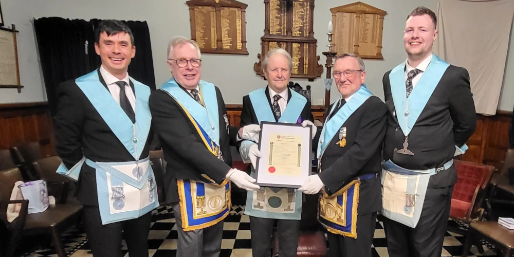 W Bro David White receives 50 year certificate with members of the lodge